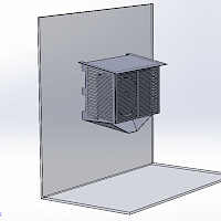 Kuva 2. Metallikotelo ja vedenohjauslevy.